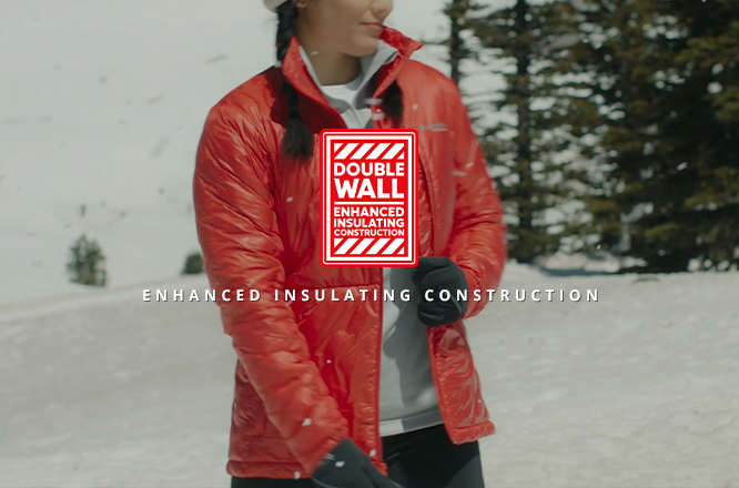 Person in show wearing insulated jacket with Double Wall technology